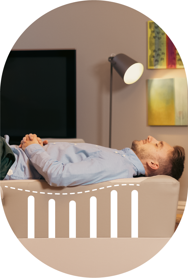 Man with closed eyes laying down on Backhug device with graphic overlay showing robotic fingers scanning the back